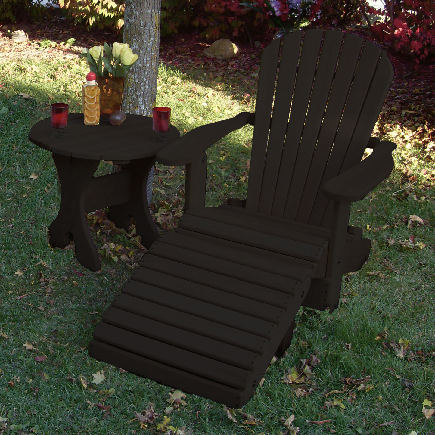 Black Poly-Luxe 100% Recycled Plastic Royal Single Patio Set, 1 Adirondack Royal Chair, 1 Royal Adirondack Footstool Ottoman and 1 Adirondack 24" Round Table www.thebestadirondackchair.com